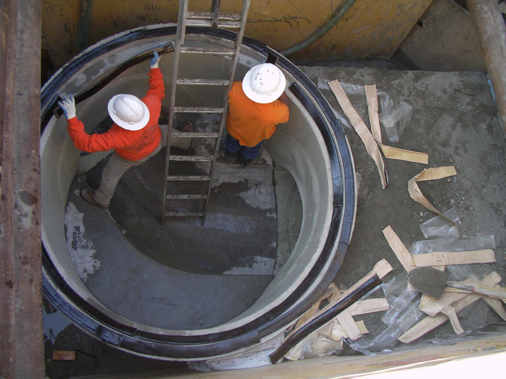 Employees Working on a Sewer